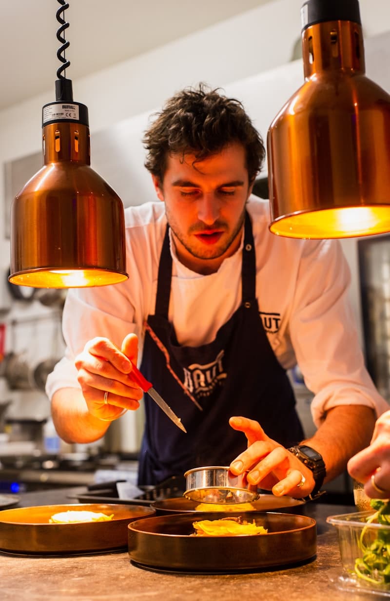 Chef plating a gourmet dish